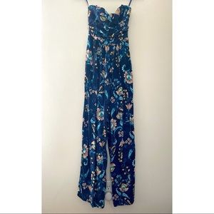 Strapless navy blue jumpsuit with floral prints